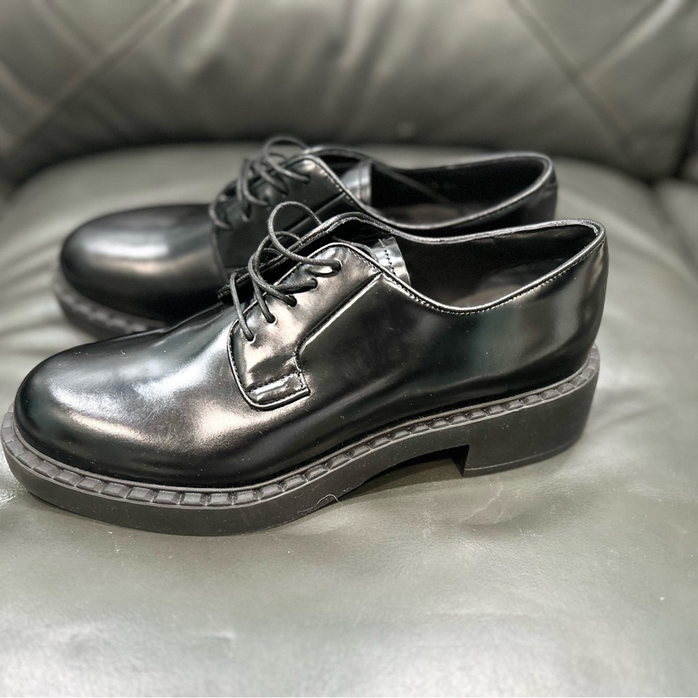 Prada laced loafers